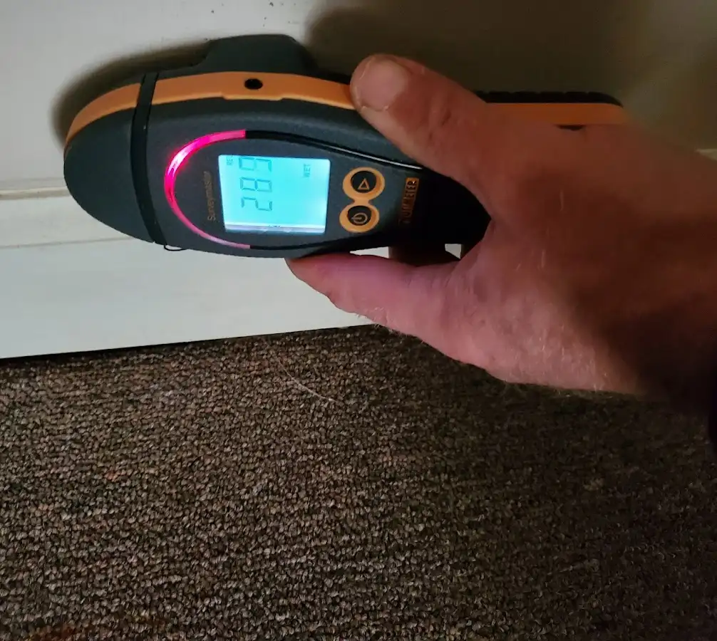 Moisture detection at baseboard during Storm Damage Restoration in Larkfield-Wikiup
